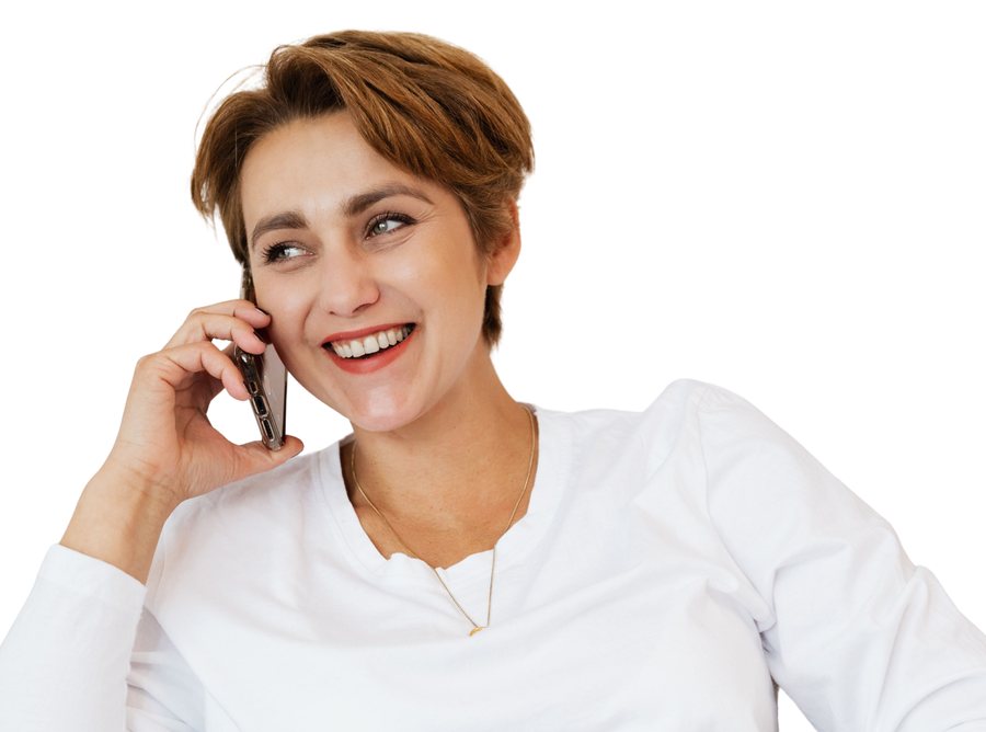 A buyer smiling on a phone call